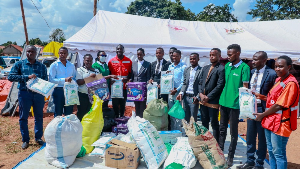 KIU GUILD UNION DONATES AID TO KITEEZI LANDFILL VICTIMS