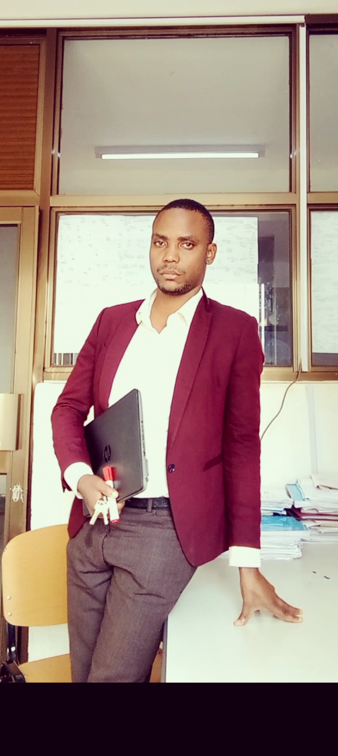 Mr Ambrose Muheirwe